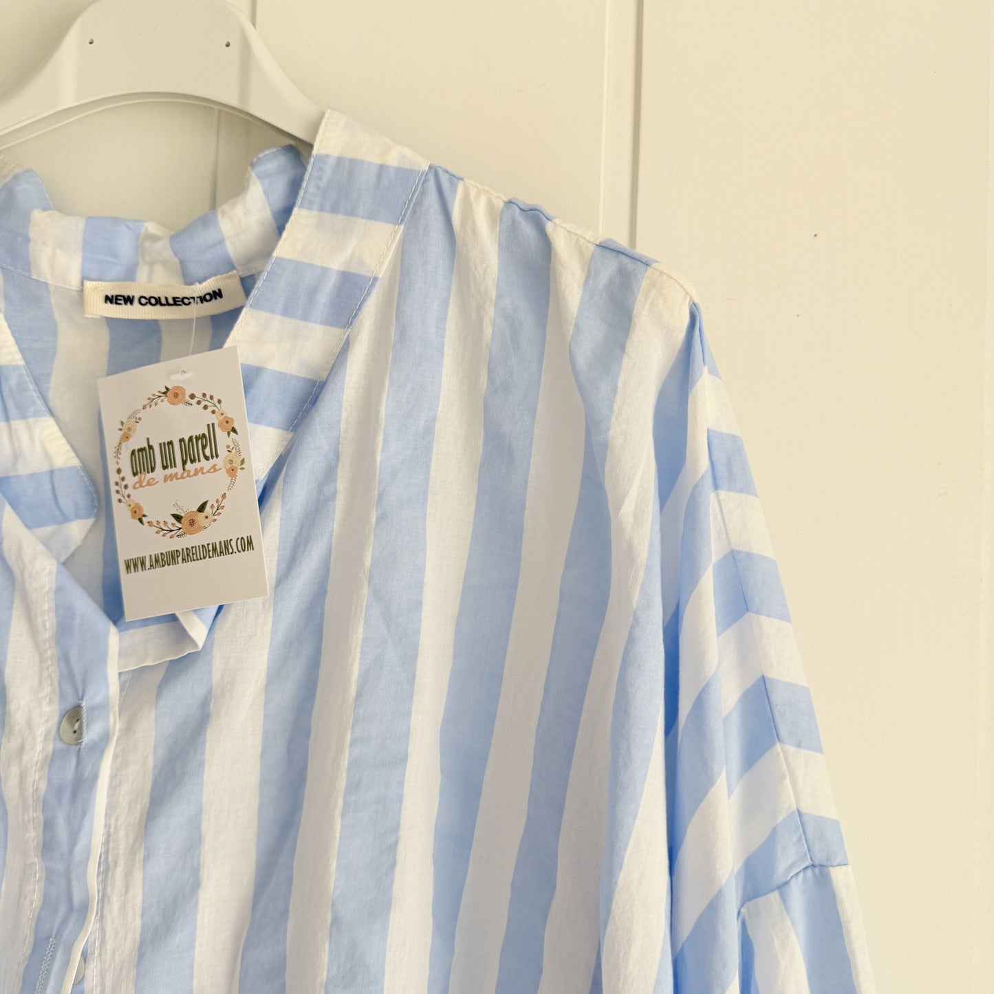 Blusa Marisa rayas cielo y blanco