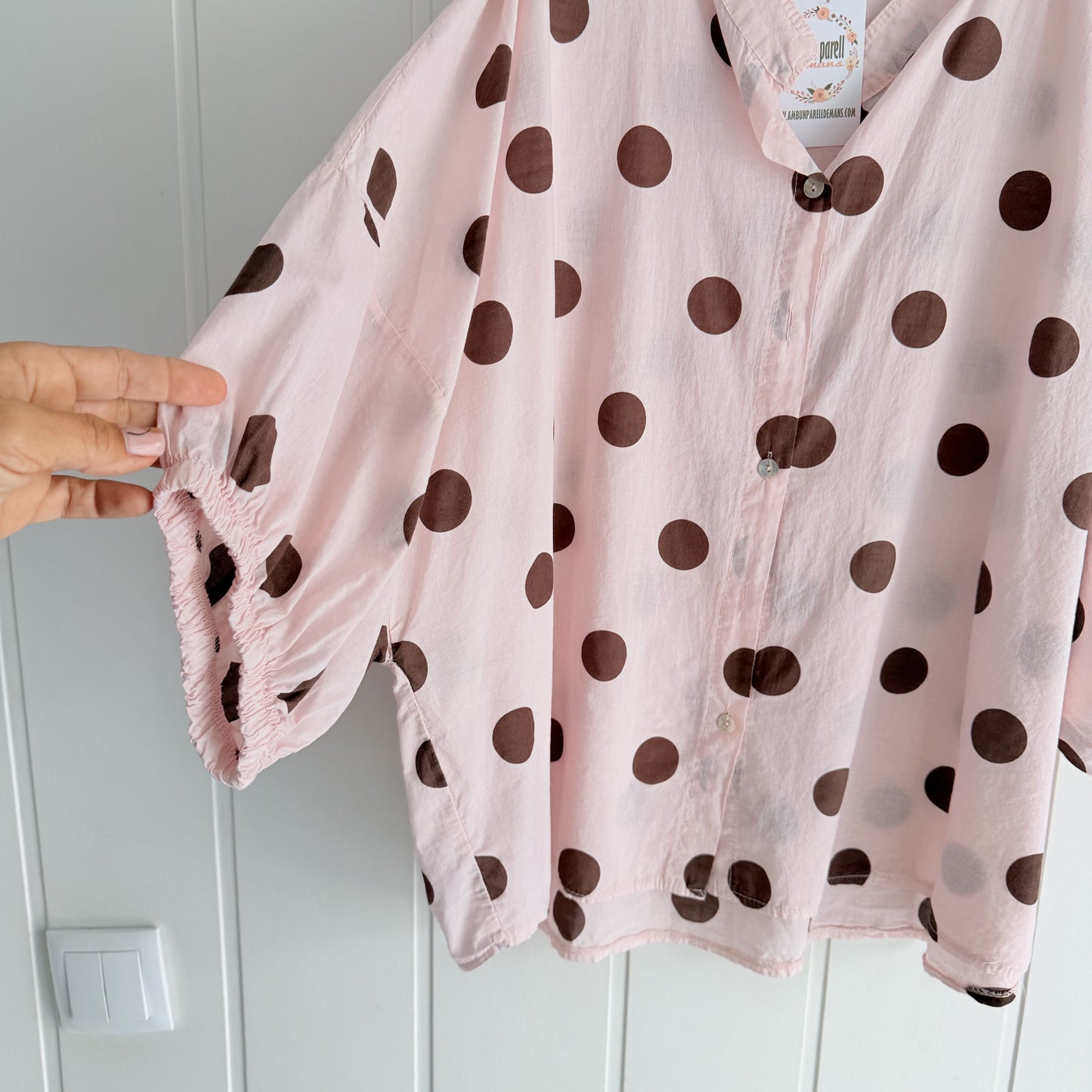 Blusa Marisa topos rosa