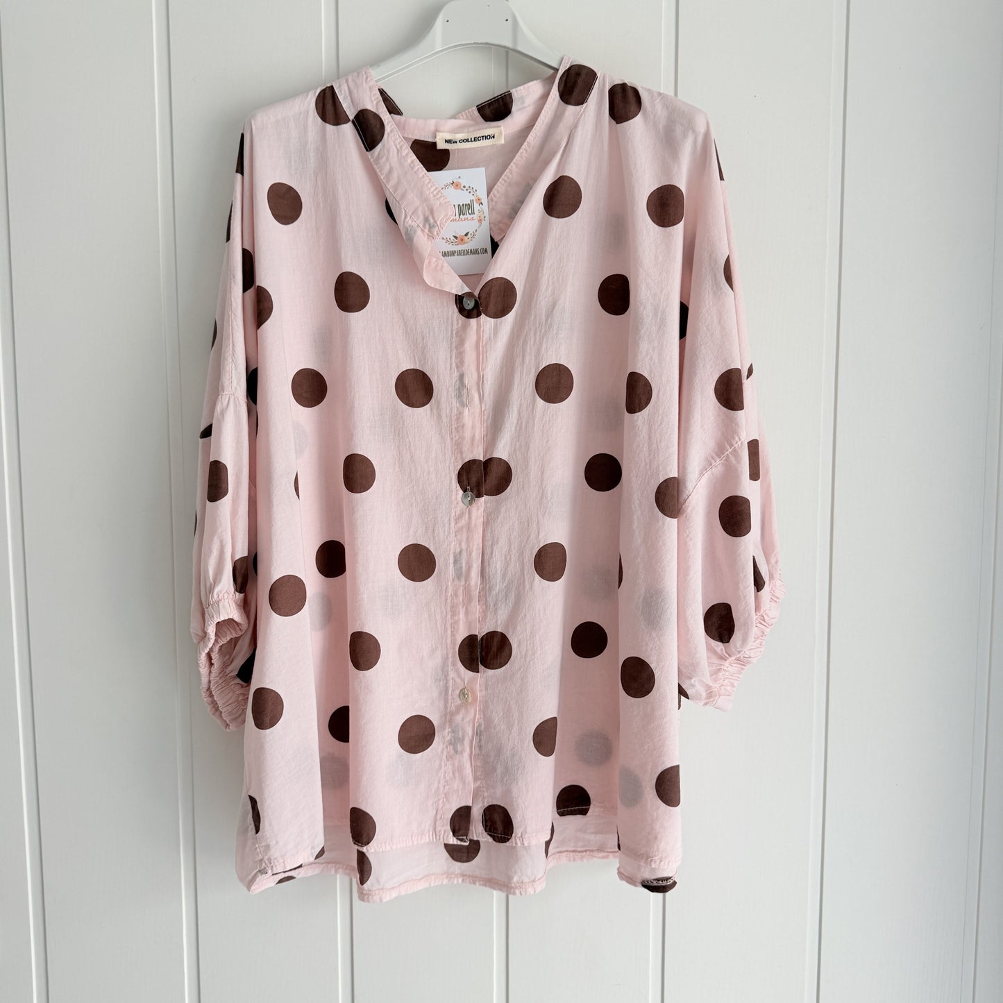 Blusa Marisa topos rosa