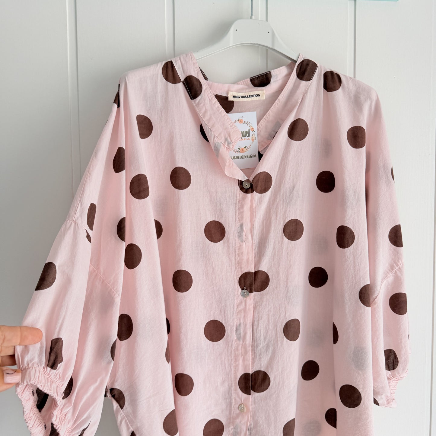 Blusa Marisa topos rosa