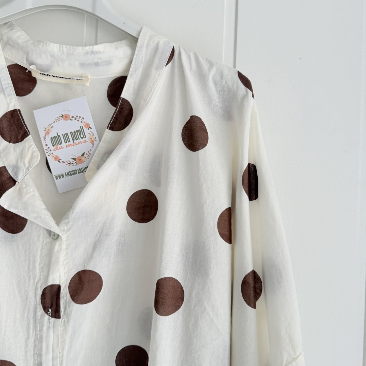 Blusa Marisa topos beige