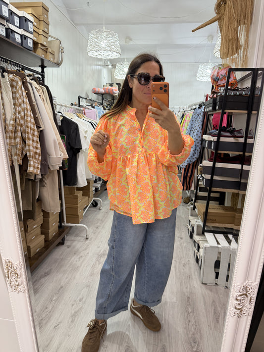 Blusa Santorini oversize naranja y amarillo fluor