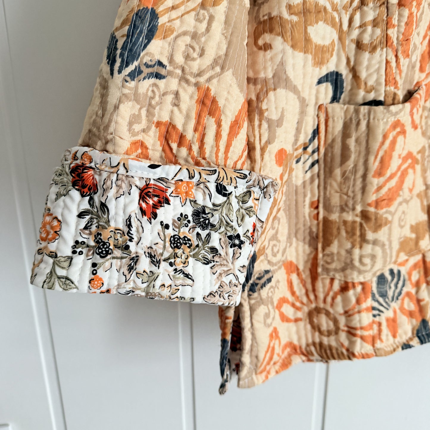 Chaqueta India reversible flores beige y teja