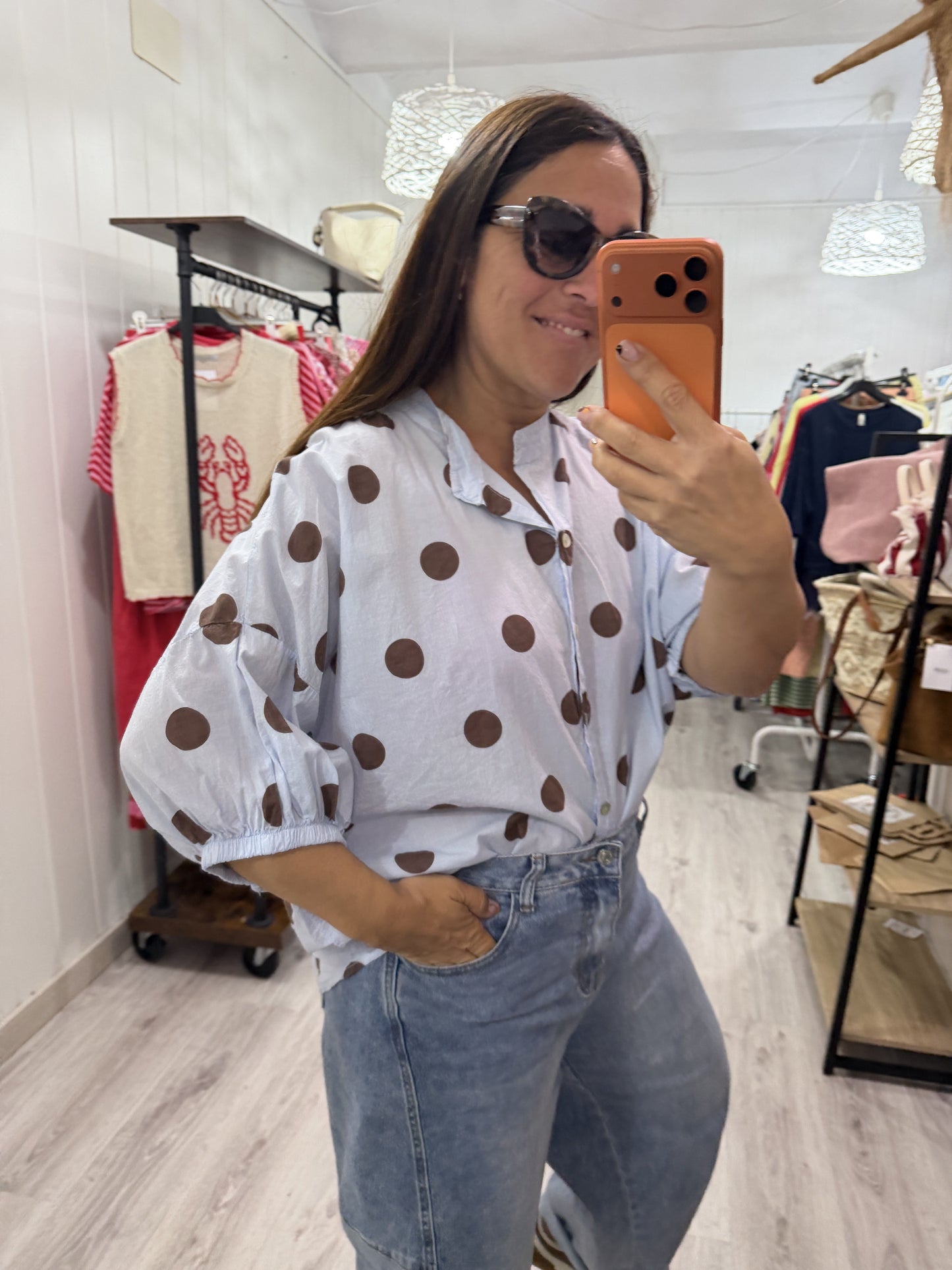 Blusa Marisa topos cielo