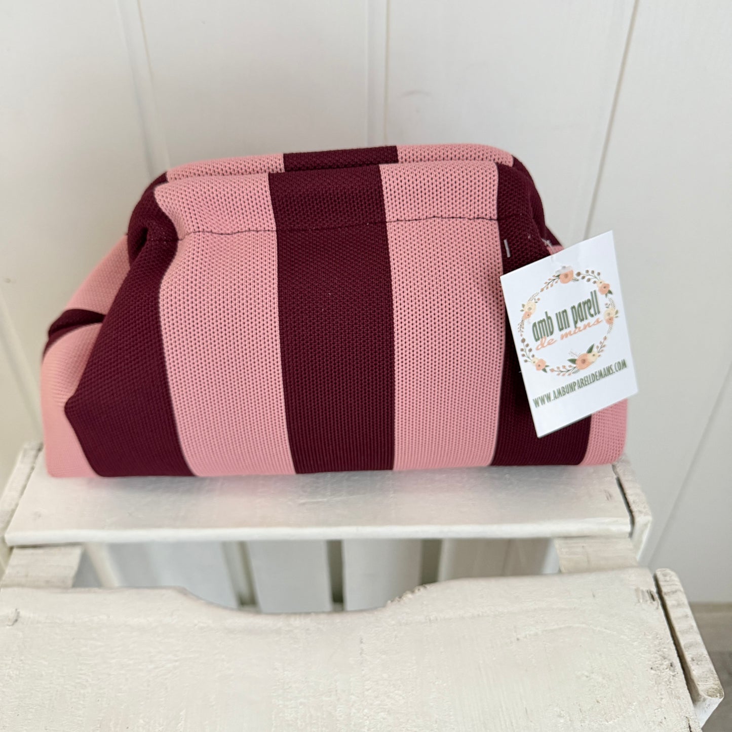 Bolso mano y bandolera Rayas rosa y burdeos