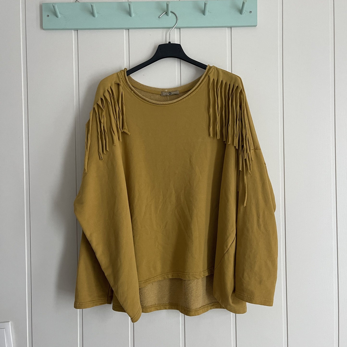 Sudadera Dakota flecos mostaza