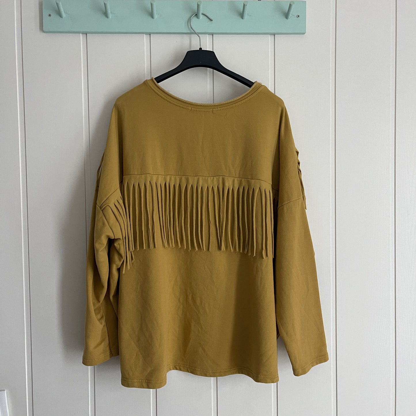 Sudadera Dakota flecos mostaza