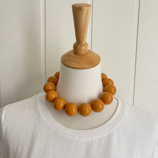 Collar Bolas mostaza